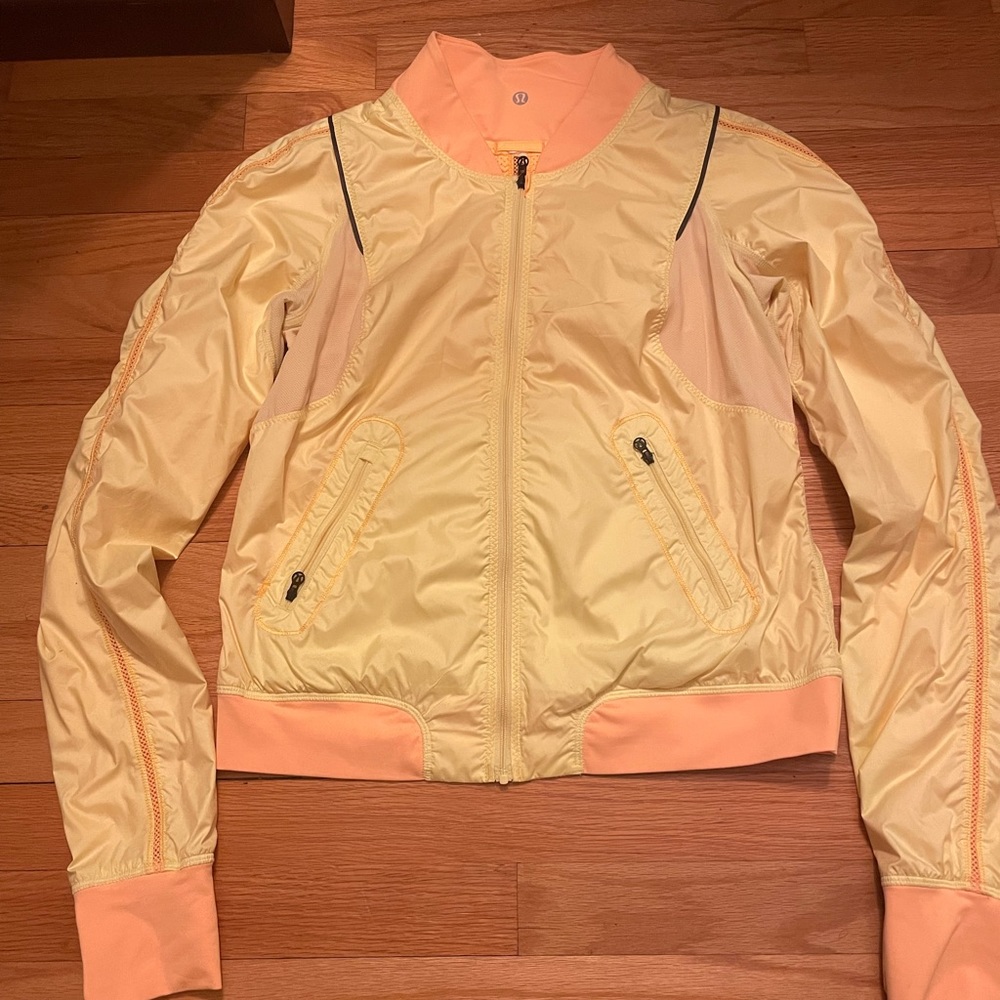 Lululemon Reversible Jacket Size 8 Yellow on one side Orange on the other side
